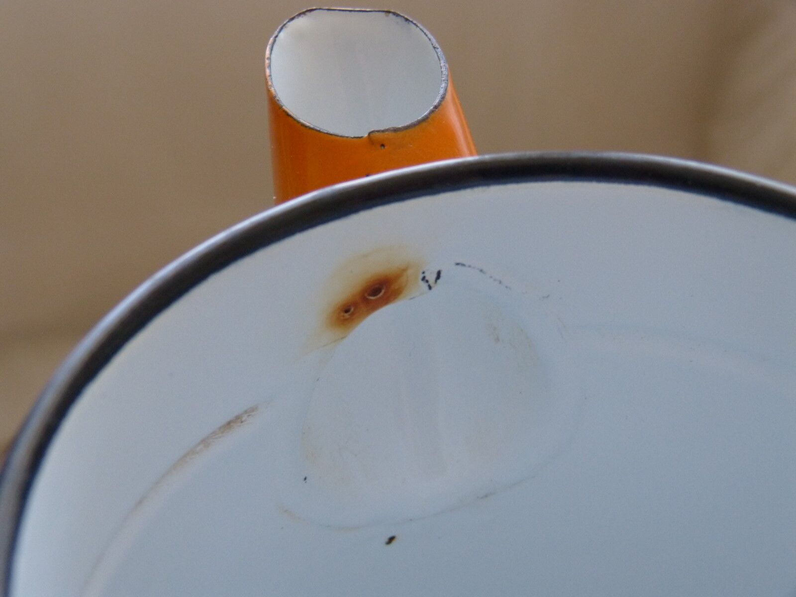 Old orange enamel coffee maker