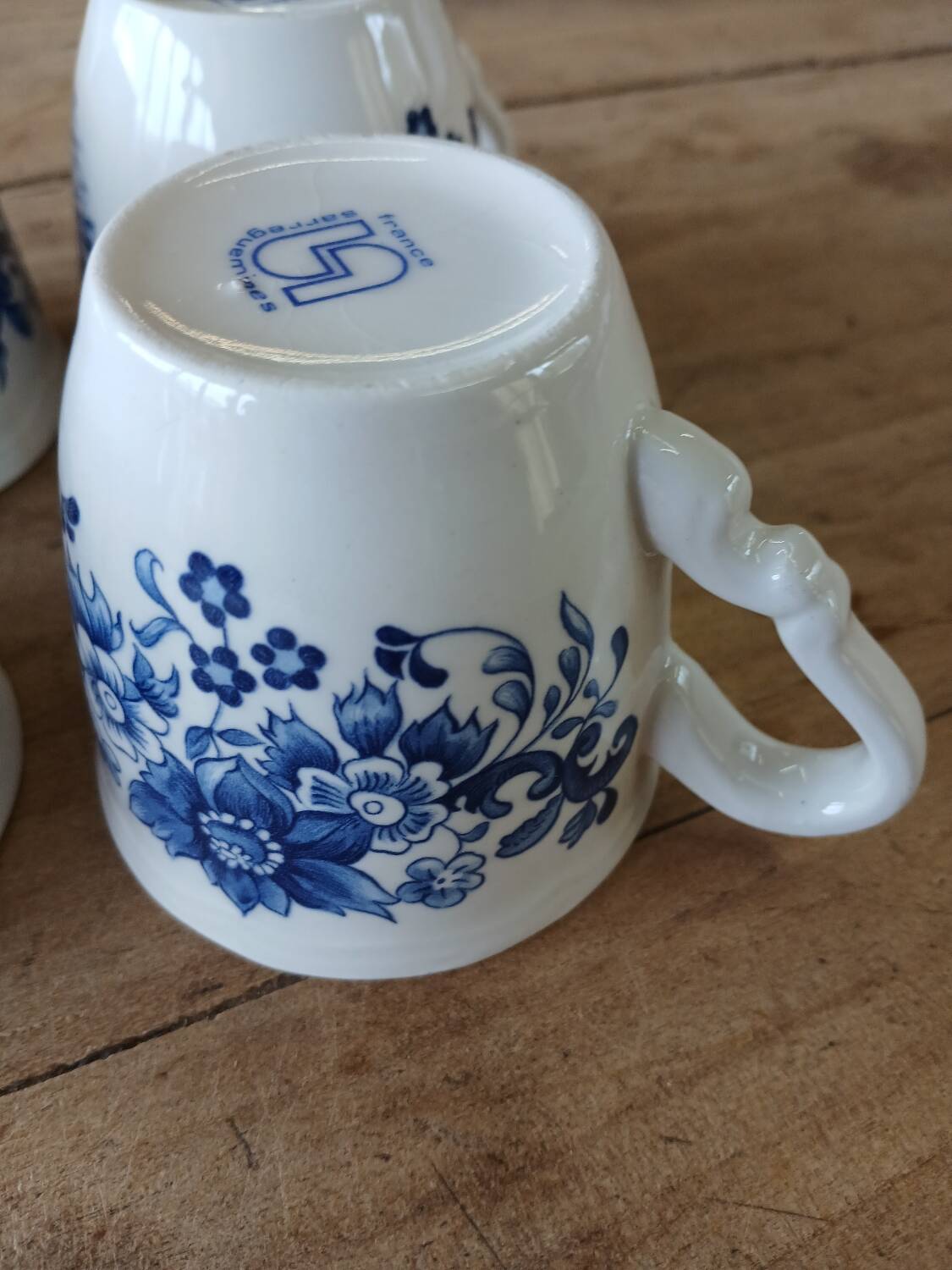 4 antique cups and saucers