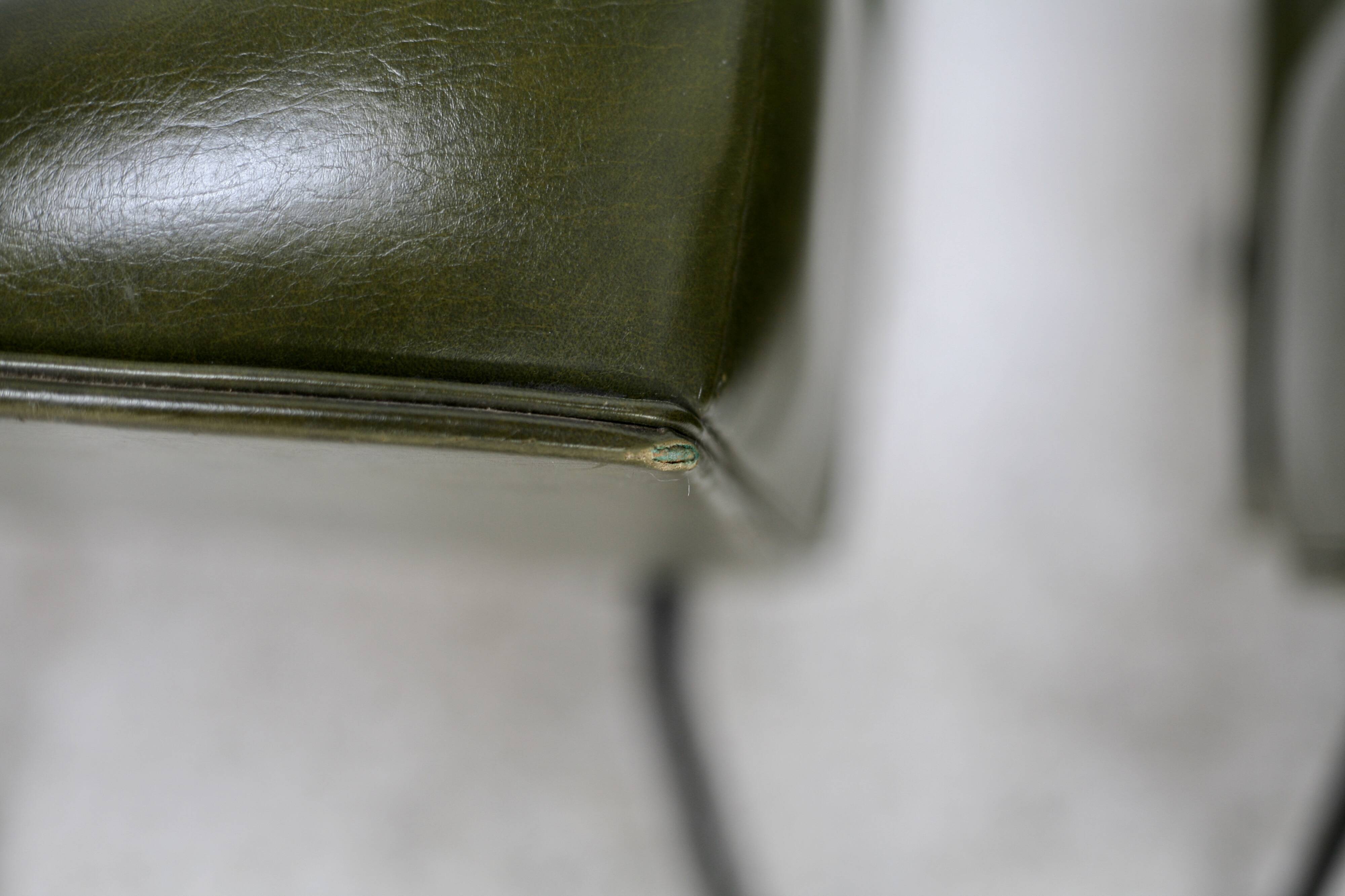 Pair of tubular armchairs, imitation leather. Circa 1950