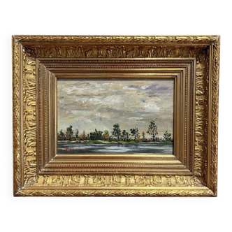 Oil on copper depicting a riverside landscape, 20th century