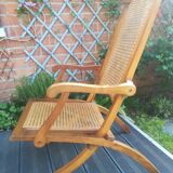 Folding beech cane armchair