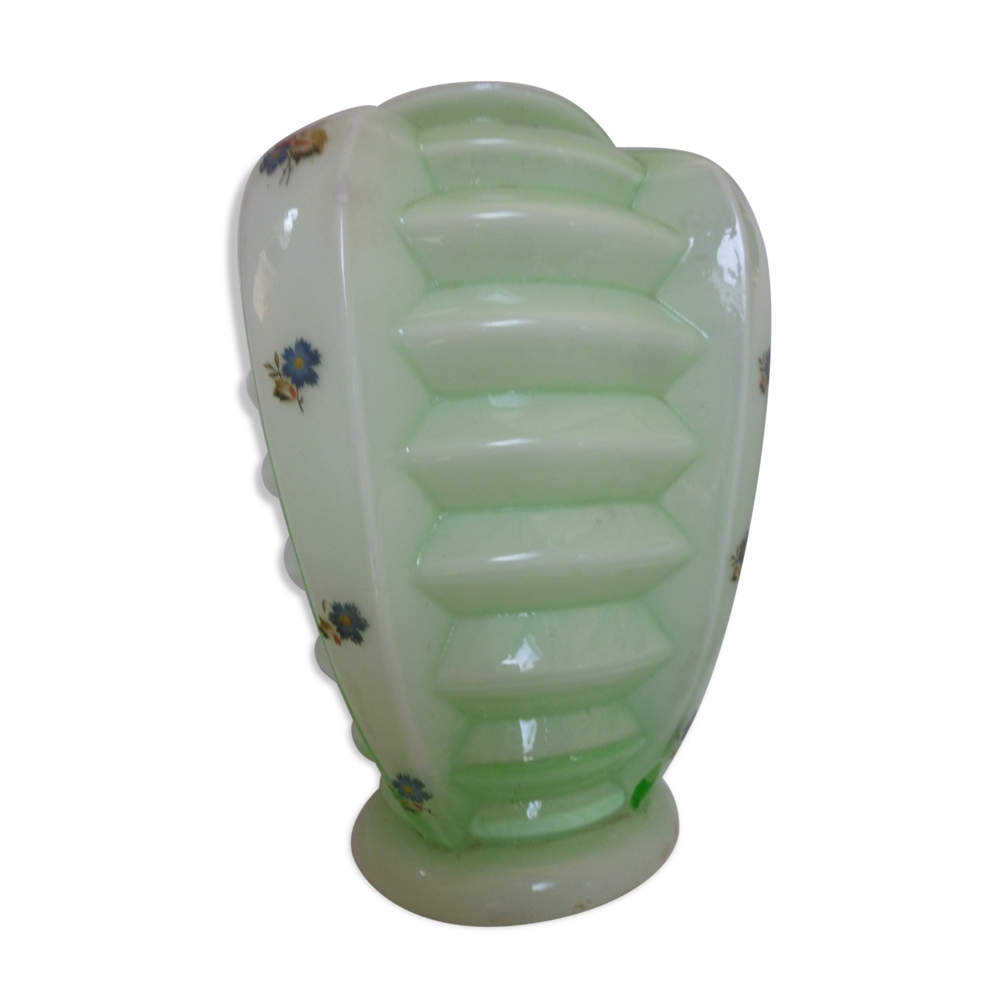 Ancient green opaline crystal vase decorated with small multicolored flowers