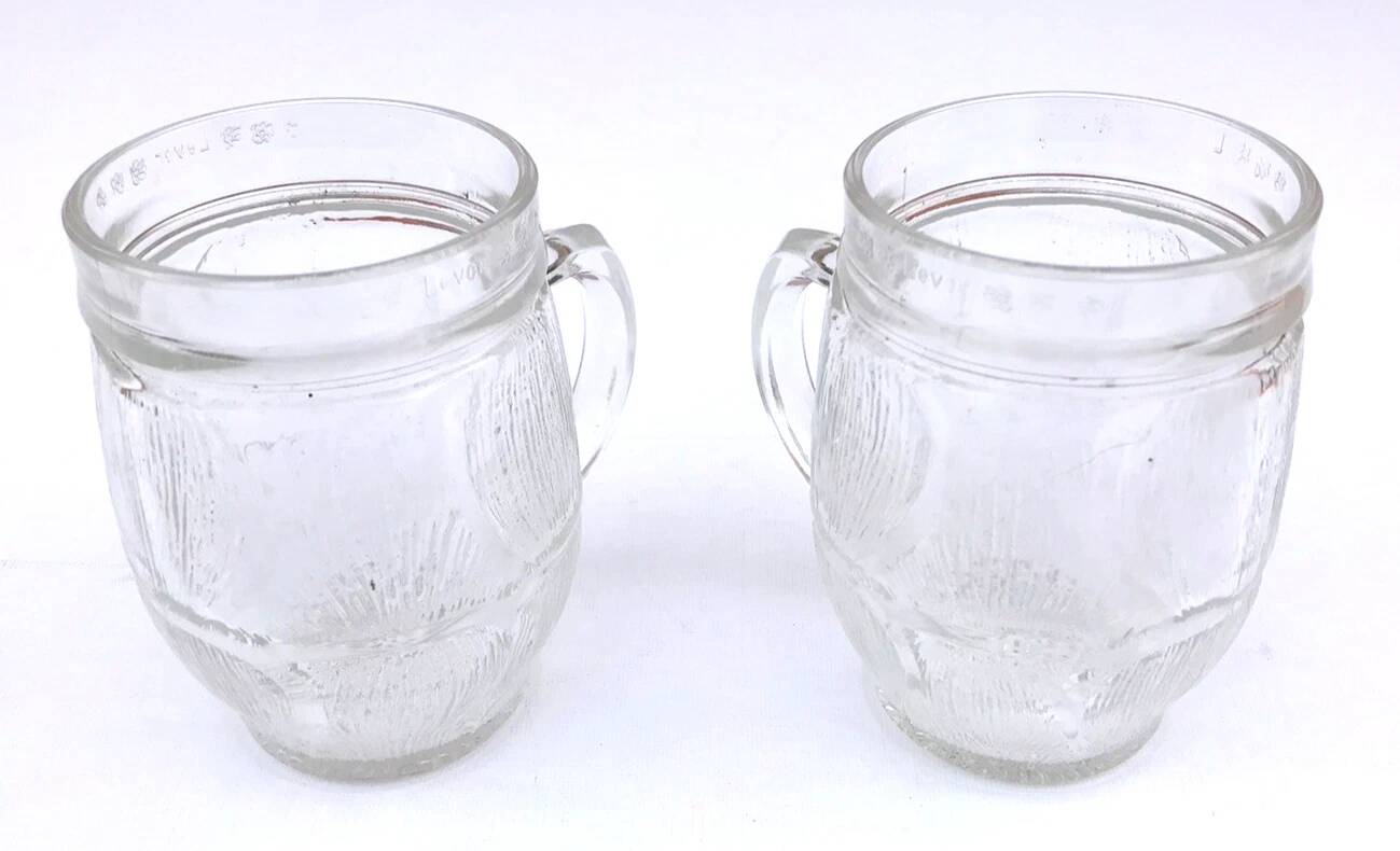 1970s 2 thick transparent glass mugs with textured bark imitation