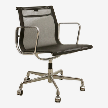 Eames armchair by Vitra model EA 117.