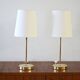 Pair of Scandinavian brass bedside lamps