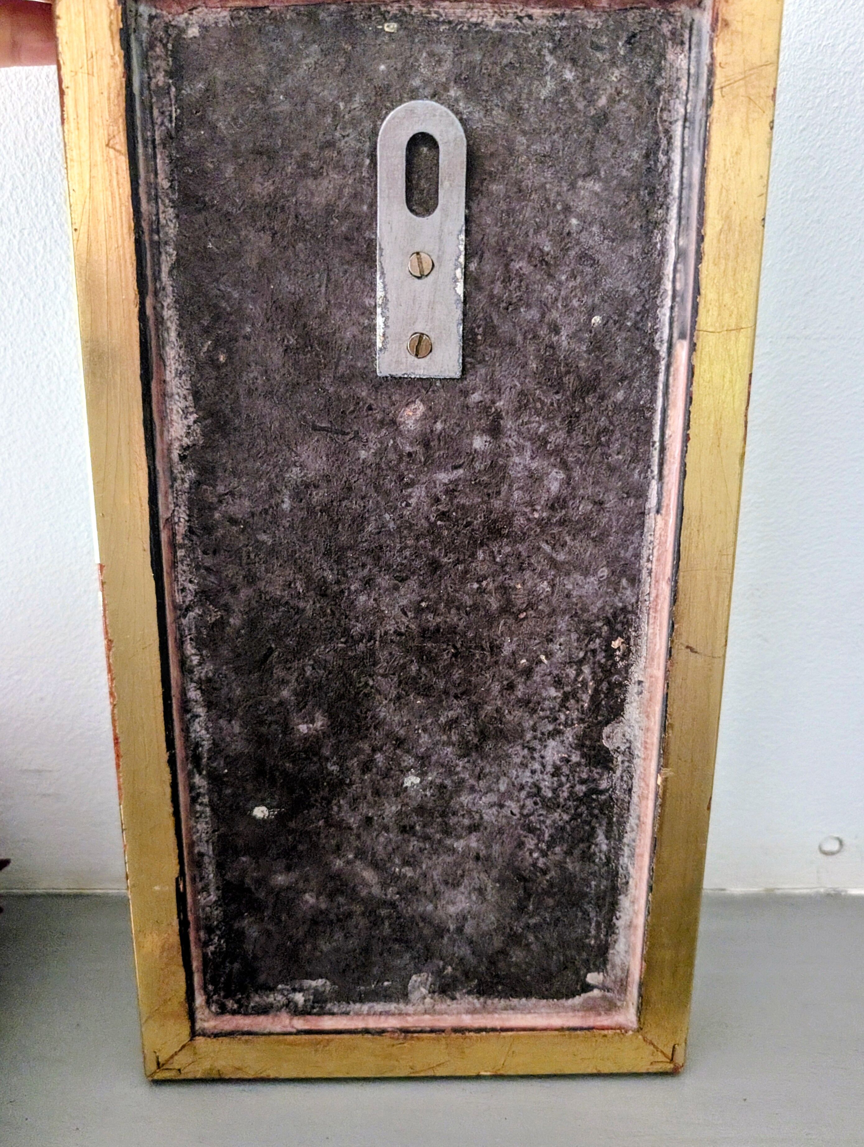 Brutalist mirror signed from the 70s.