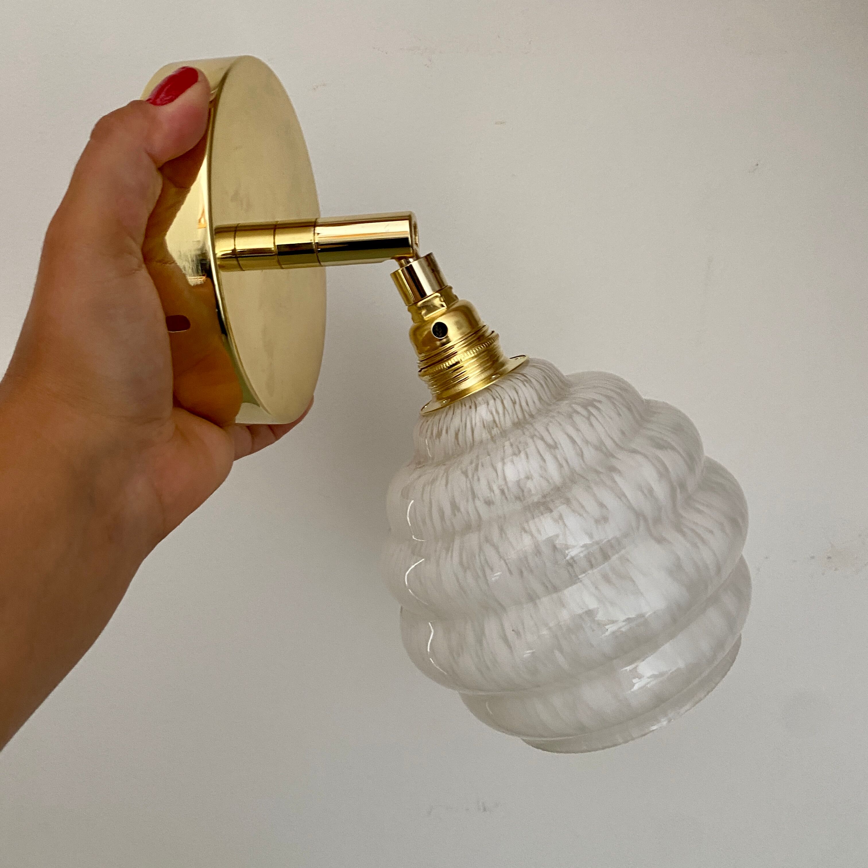 Vintage globe wall lamp in white clichy glass