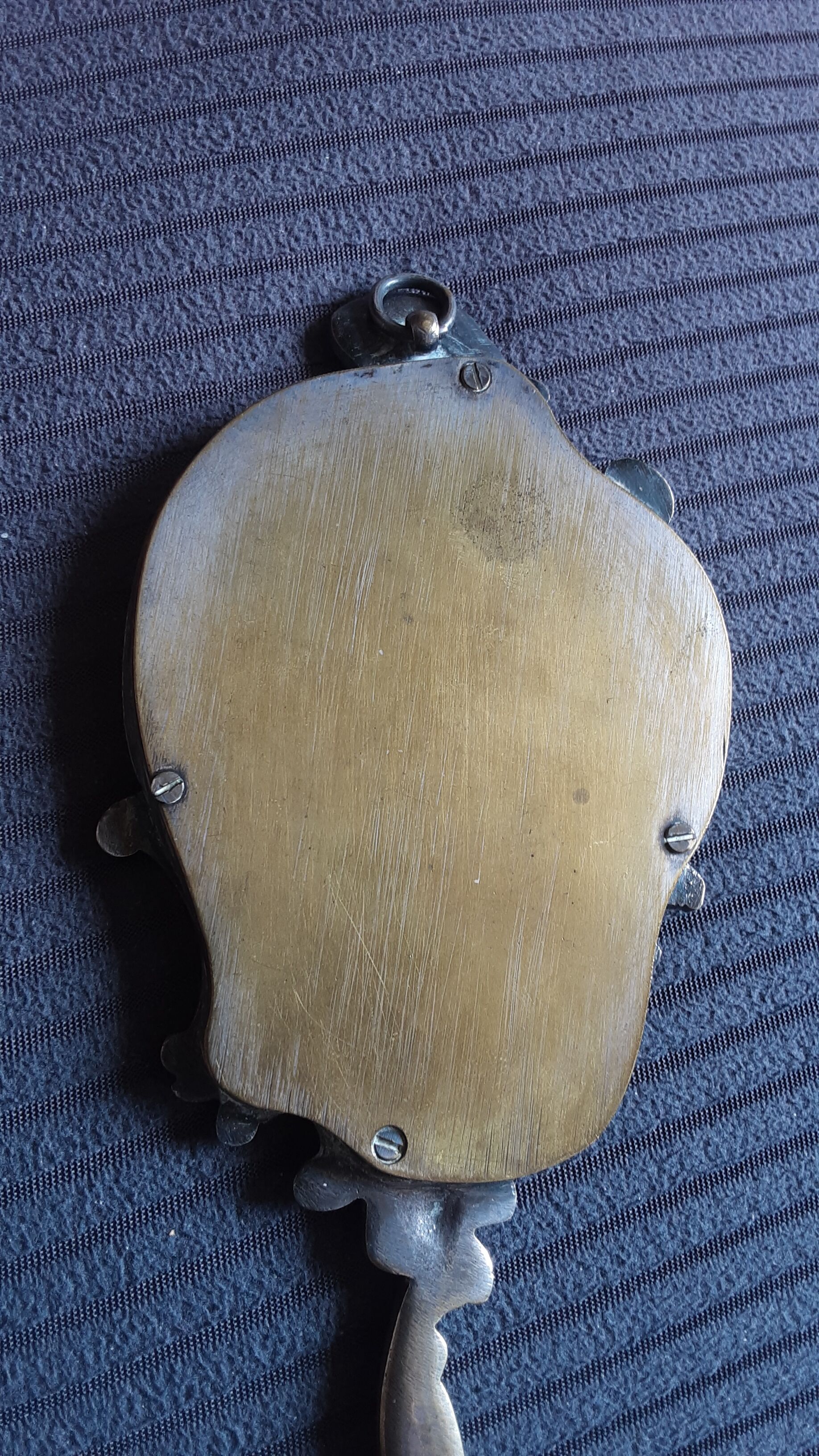 Bronze antique hand mirror