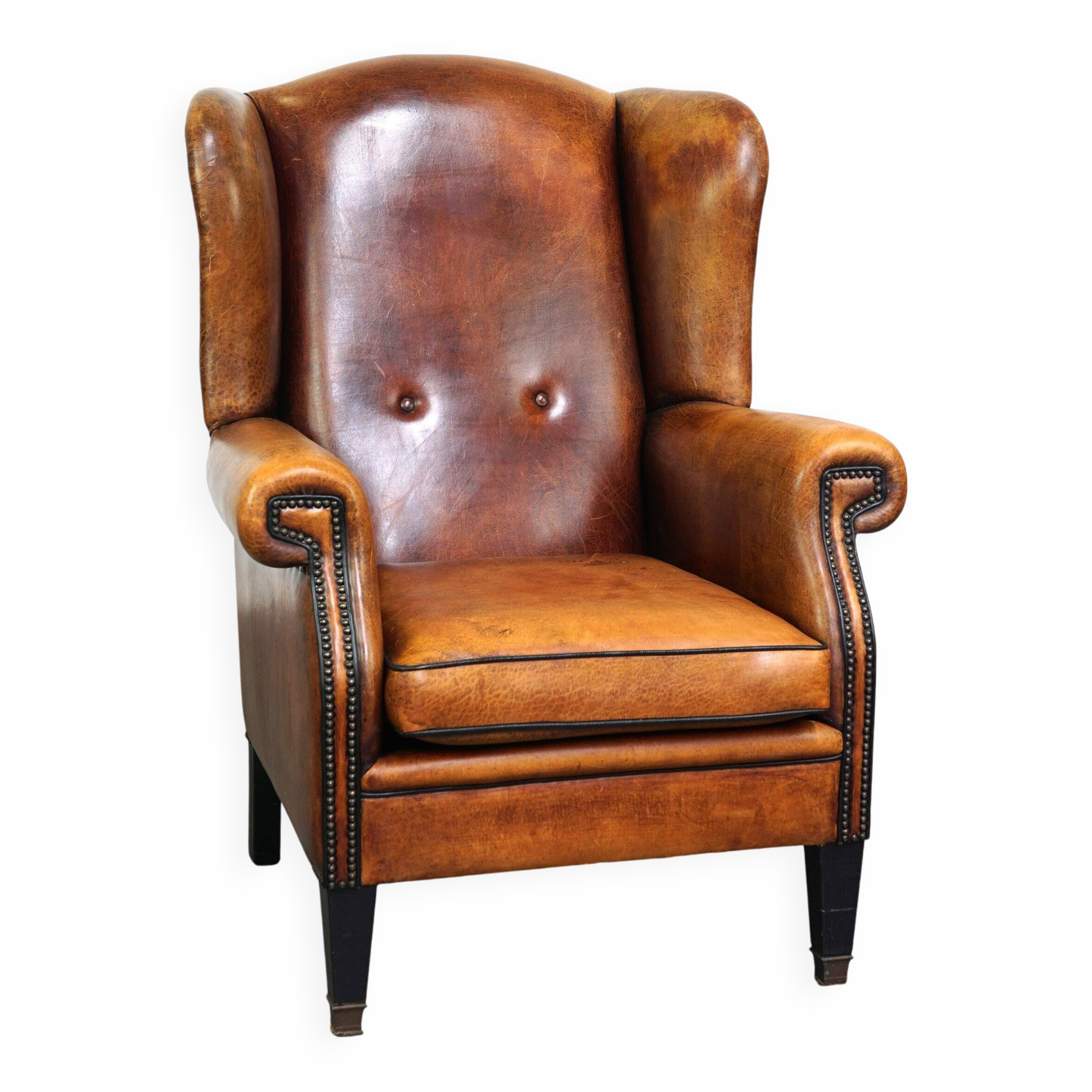 Sheepskin leather chair with a beautiful patina