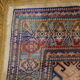 Tapis Kazak 180x150 cm vintage fait main motifs orientaux ocre et bordeaux