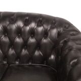 Three-seater black leather chesterfield sofa