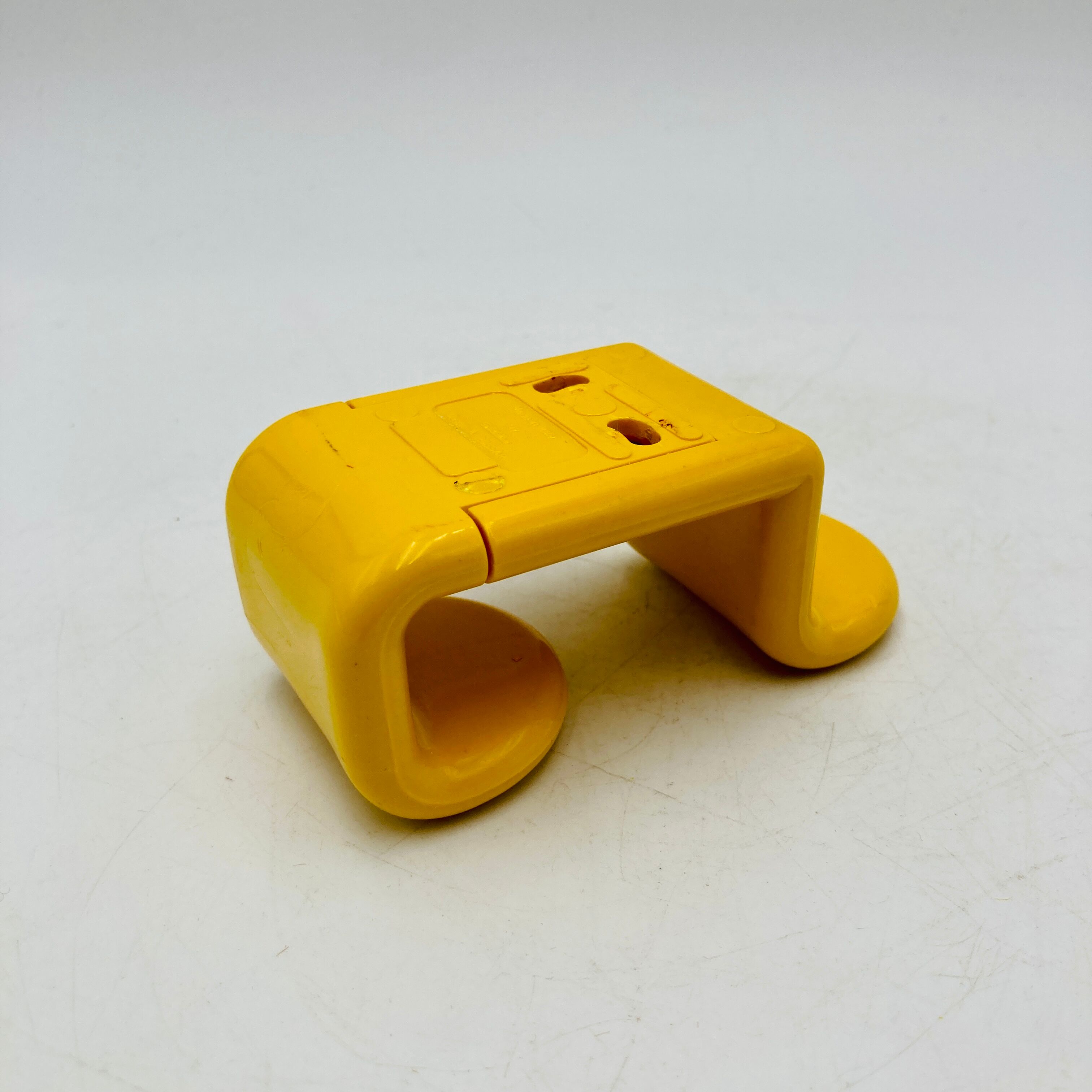 Yellow plastic hooks, design A. Rossari, Gedy edition.