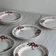 Set of 8 old earthenware plates