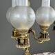 Pair of three-light candelabra in bronze, 20th century