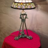 Antique patinated bronze regulator lamp with Tiffany glass shade in very good condition