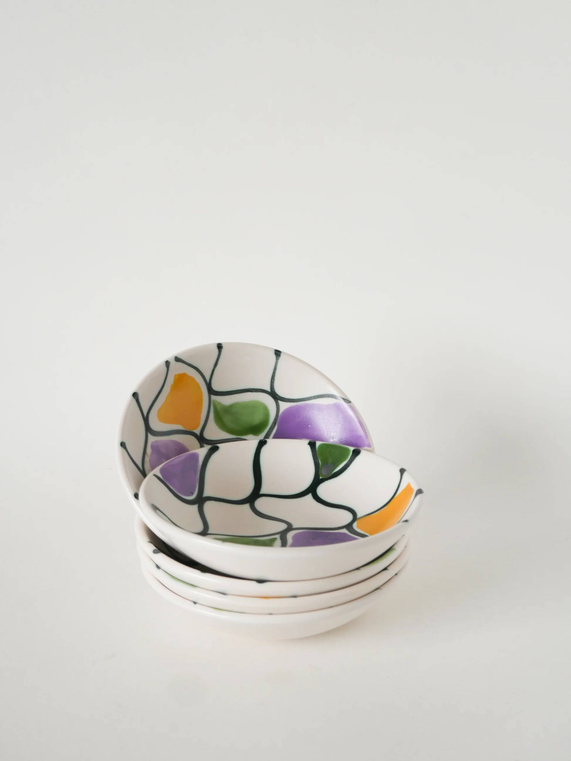 Pair of ceramic ramekins, abstract patterns in yellow, purple and green, Pornic model, 1960.