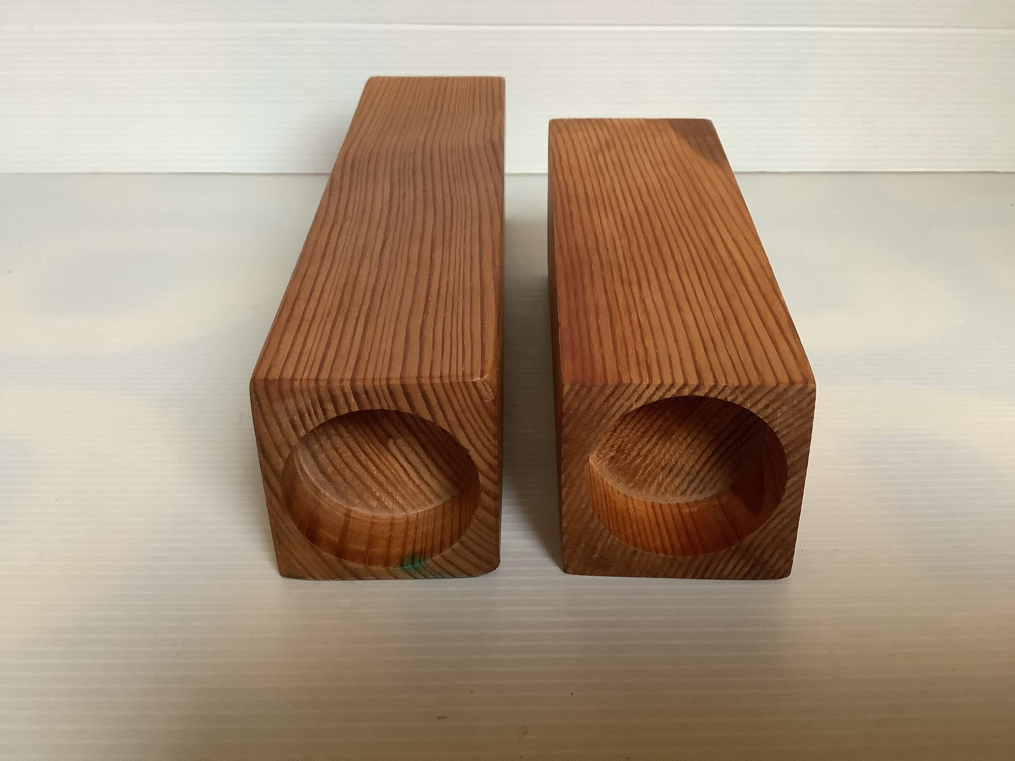 Pair of asymmetrical Scandinavian wooden candlesticks