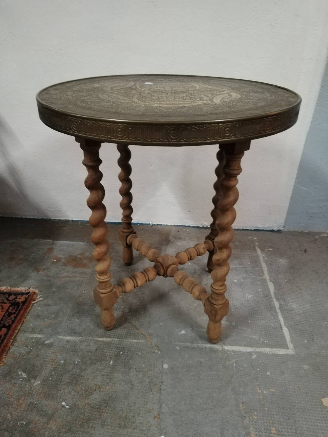 Brass side table with turned legs