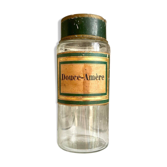 Bittersweet apothecary jar in transparent glass and green metal