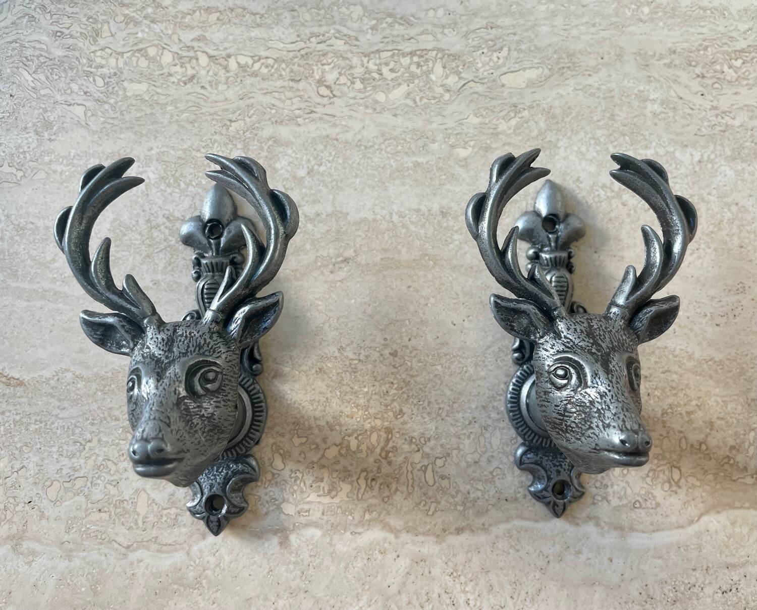 Pair of vintage deer head hooks