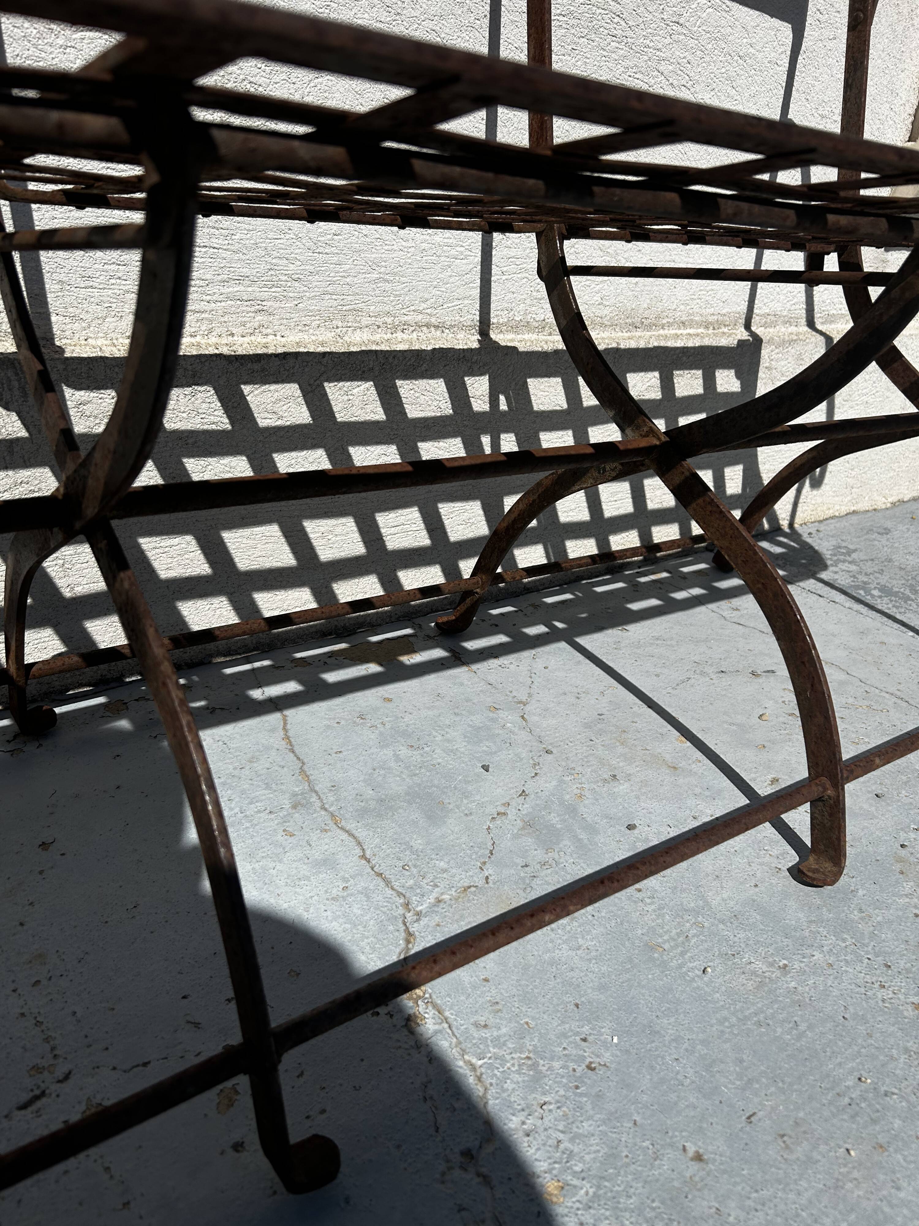 Riveted wrought iron garden bench