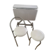 Small stools in metal and faux leather.