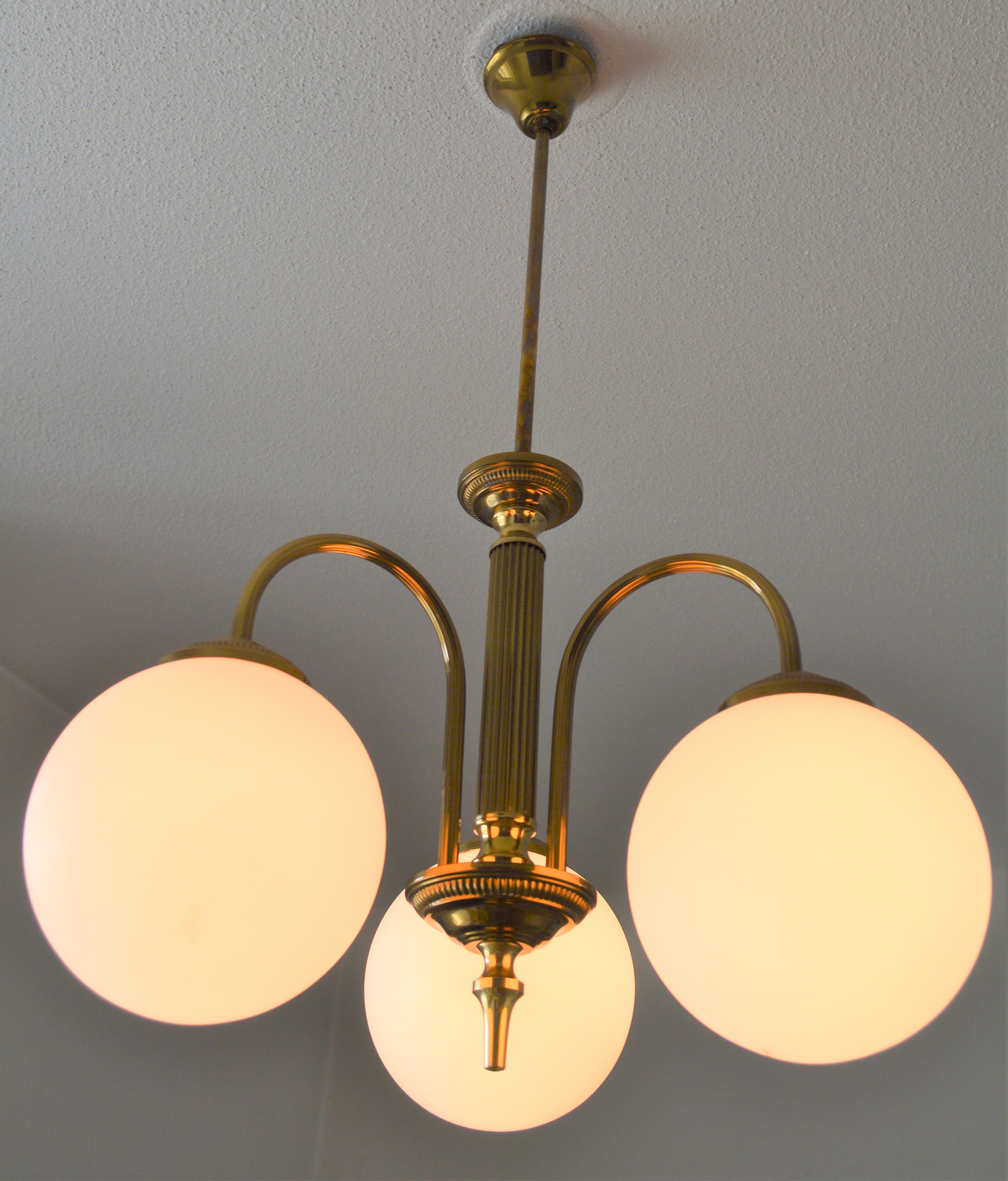 Vintage chandelier of the 60s in brass