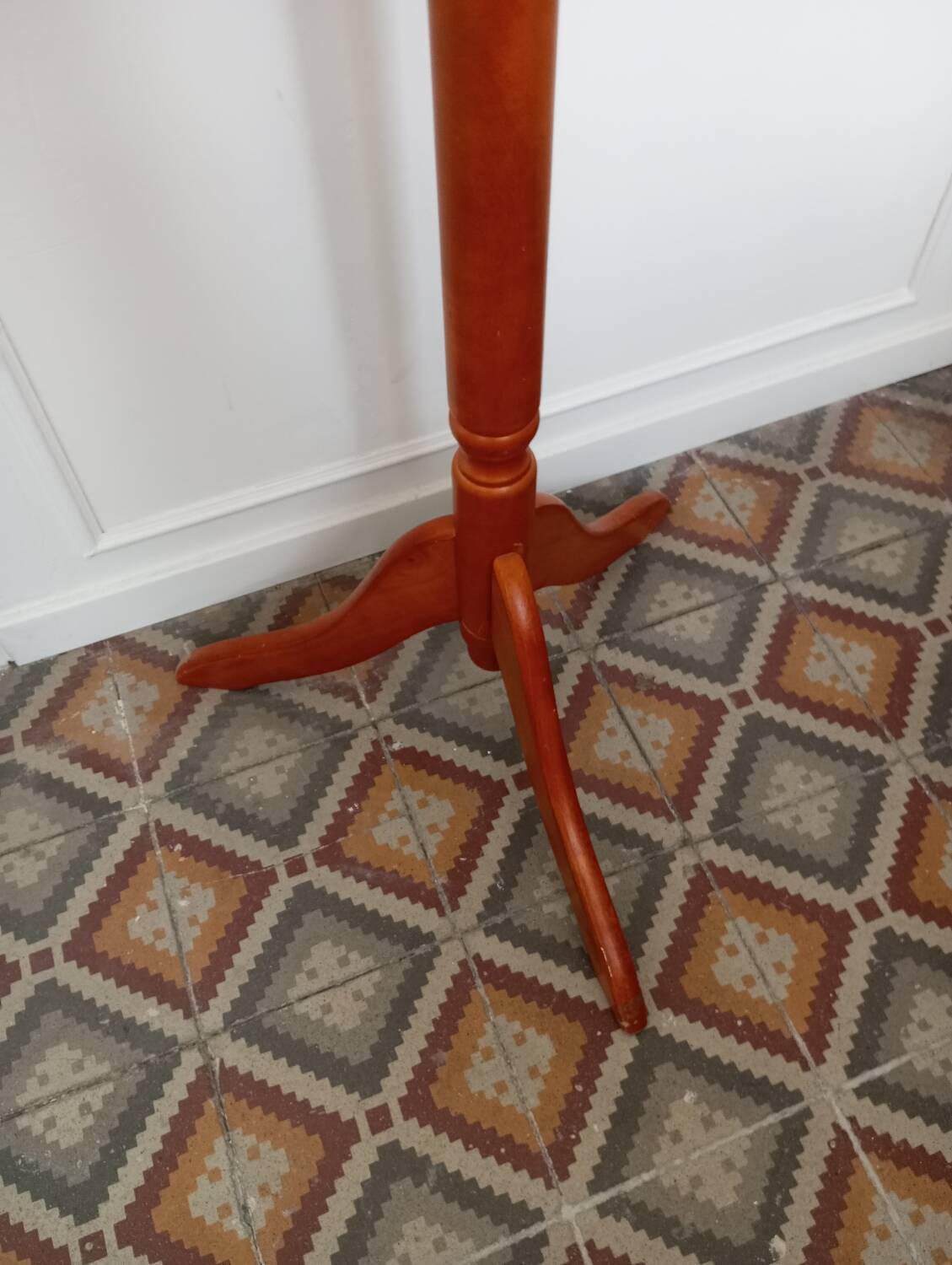 Wooden coat rack on stand