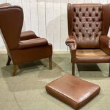 Pair of brown leather wingback Chesterfield armchairs from the 1970s.