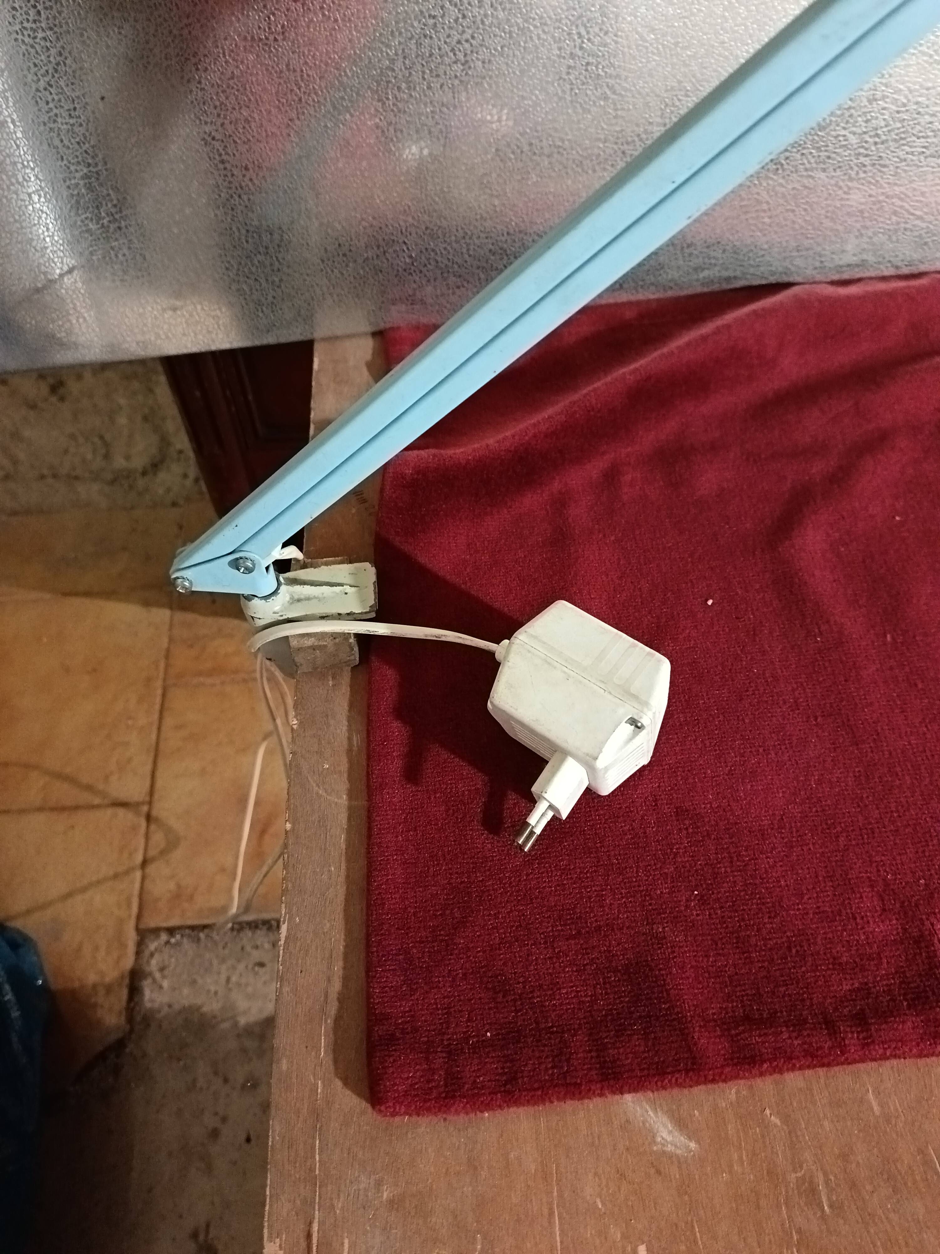 Articulated blue desk lamp