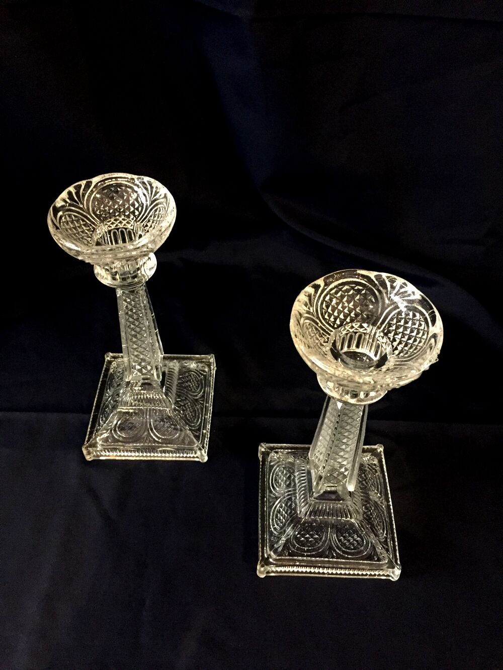 Pair of molded glass candle holders