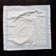 Vintage embroidered pillowcase with light blue thread.