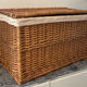 Woven wicker vintage suitcase