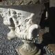 Medical vases with characters in reconstituted stone.