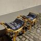 2 wooden footrests with blue cushions