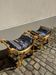 2 wooden footrests with blue cushions