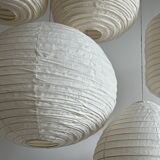 Suspension in rattan and natural japanese linen in the shape of a drop