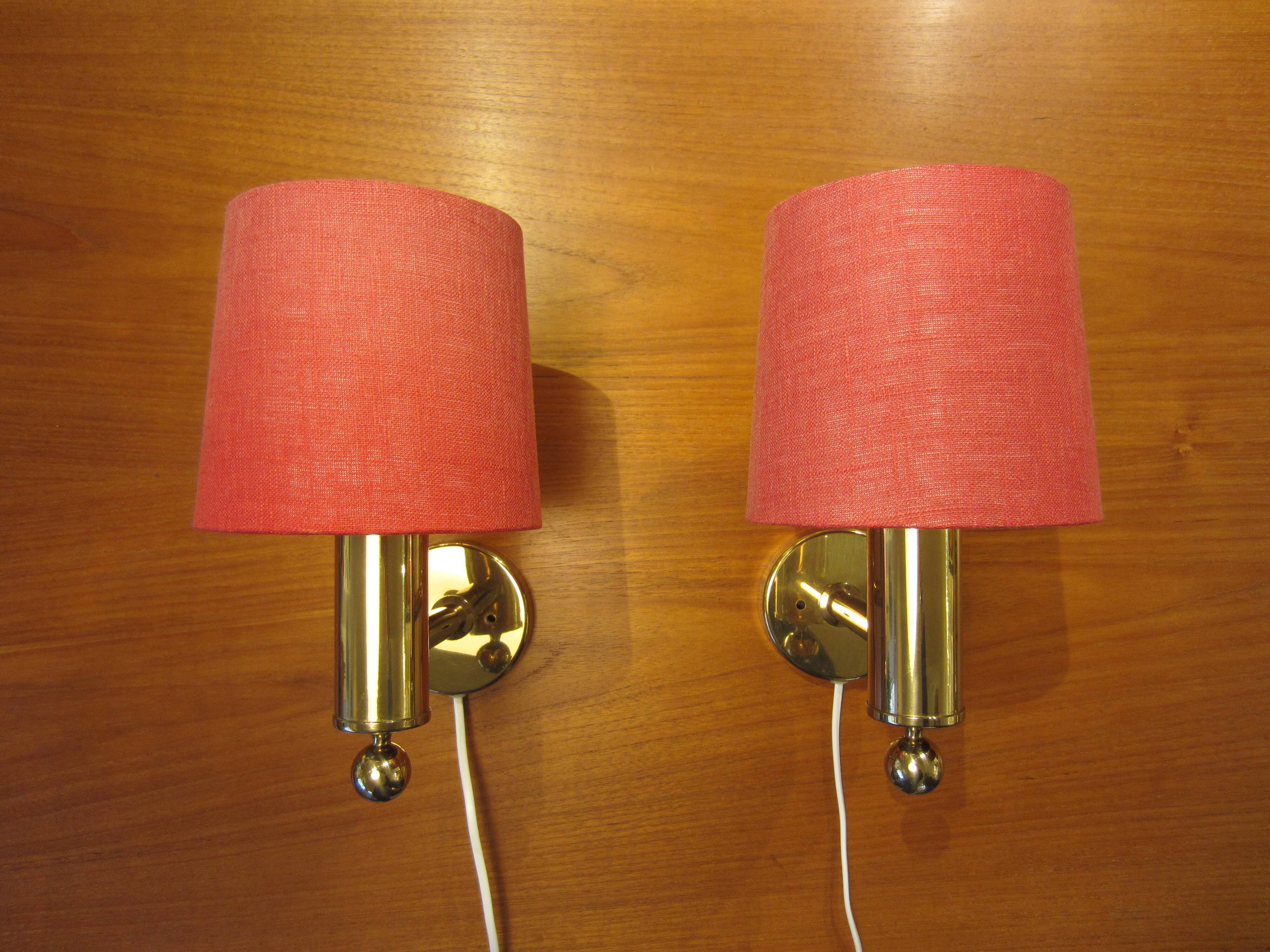 Pair of golden Scandinavian wall lights by Bergboms