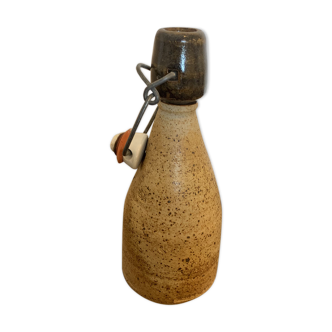 Small sandstone bottle