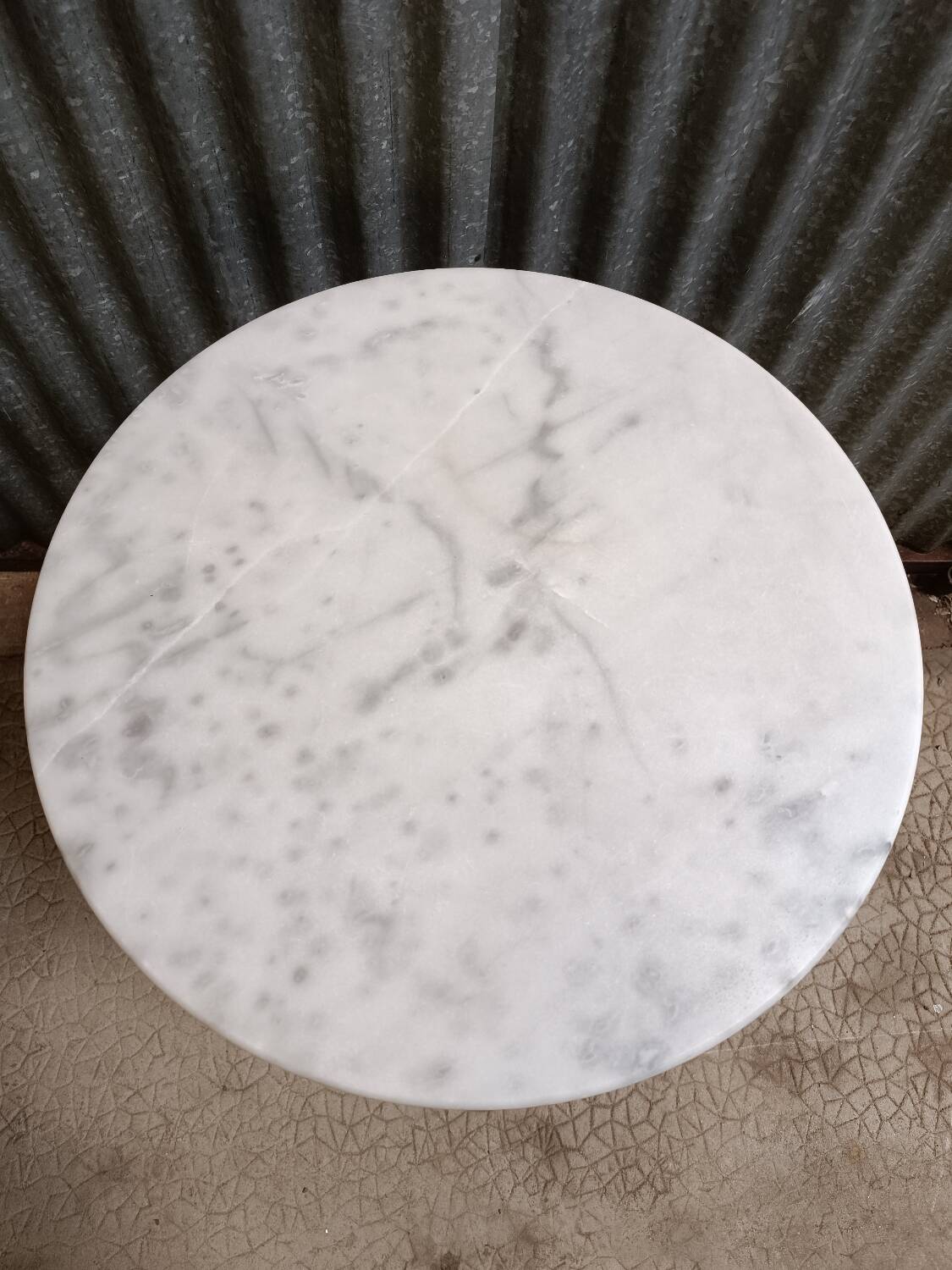 Round marble bistro table with cast iron legs