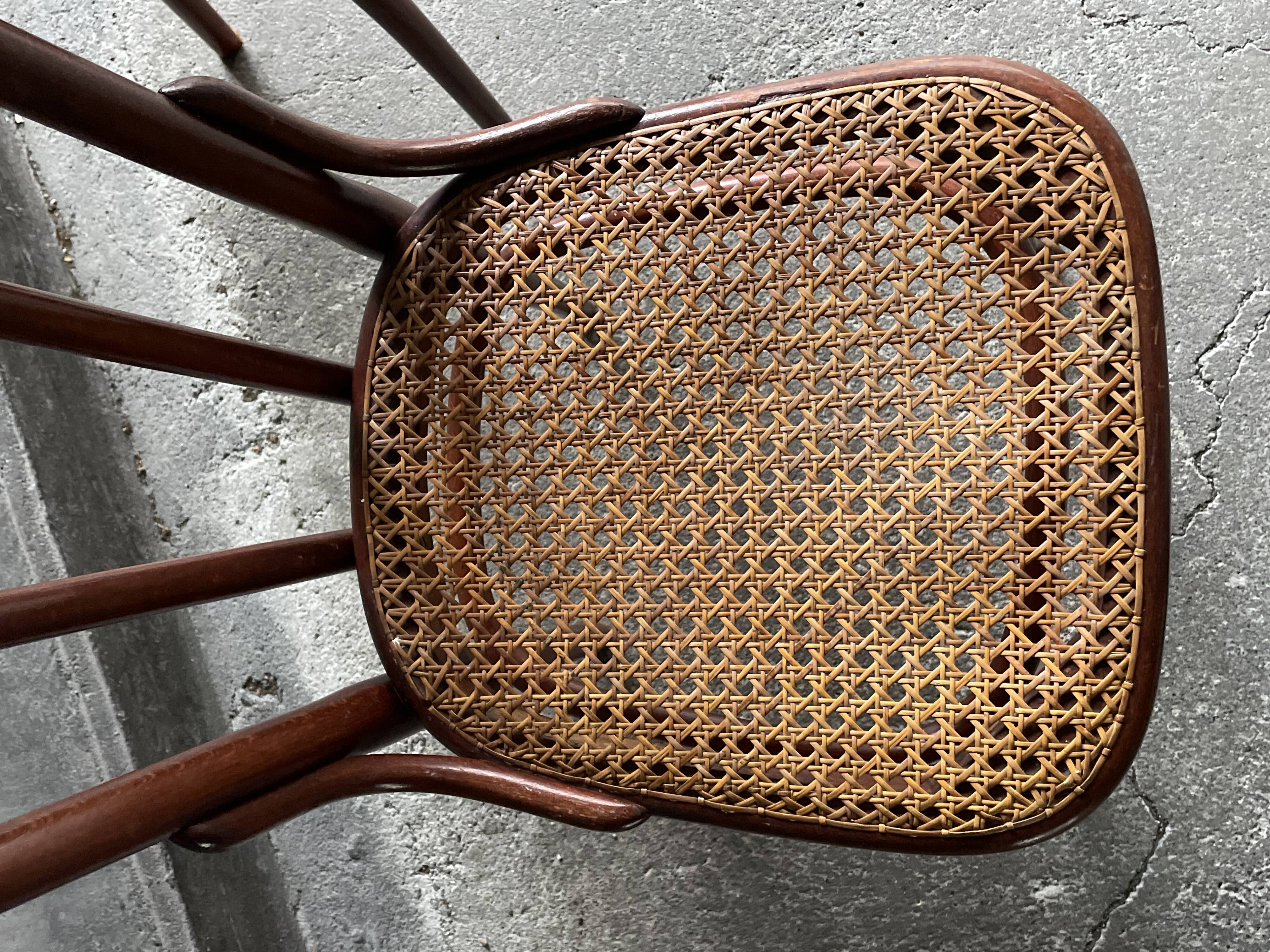 Pair of caned bistro chairs by Thonet