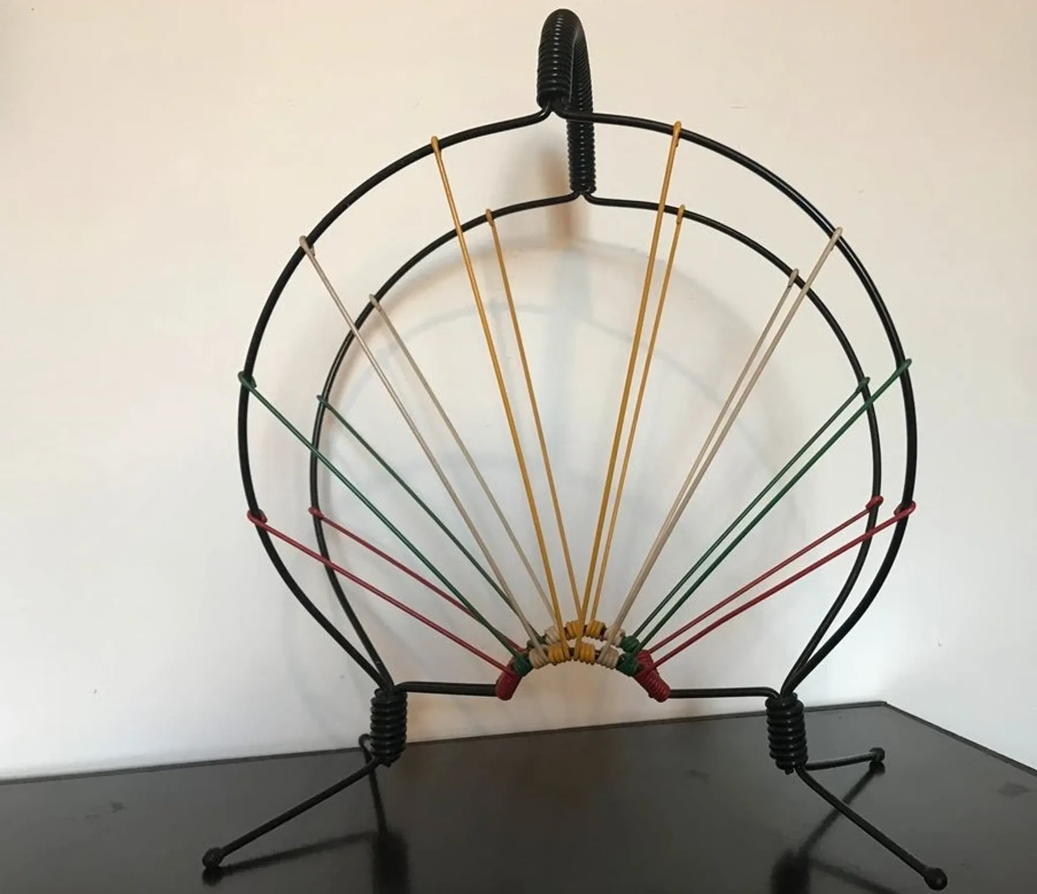 Vintage wire magazine rack from the 1950s.