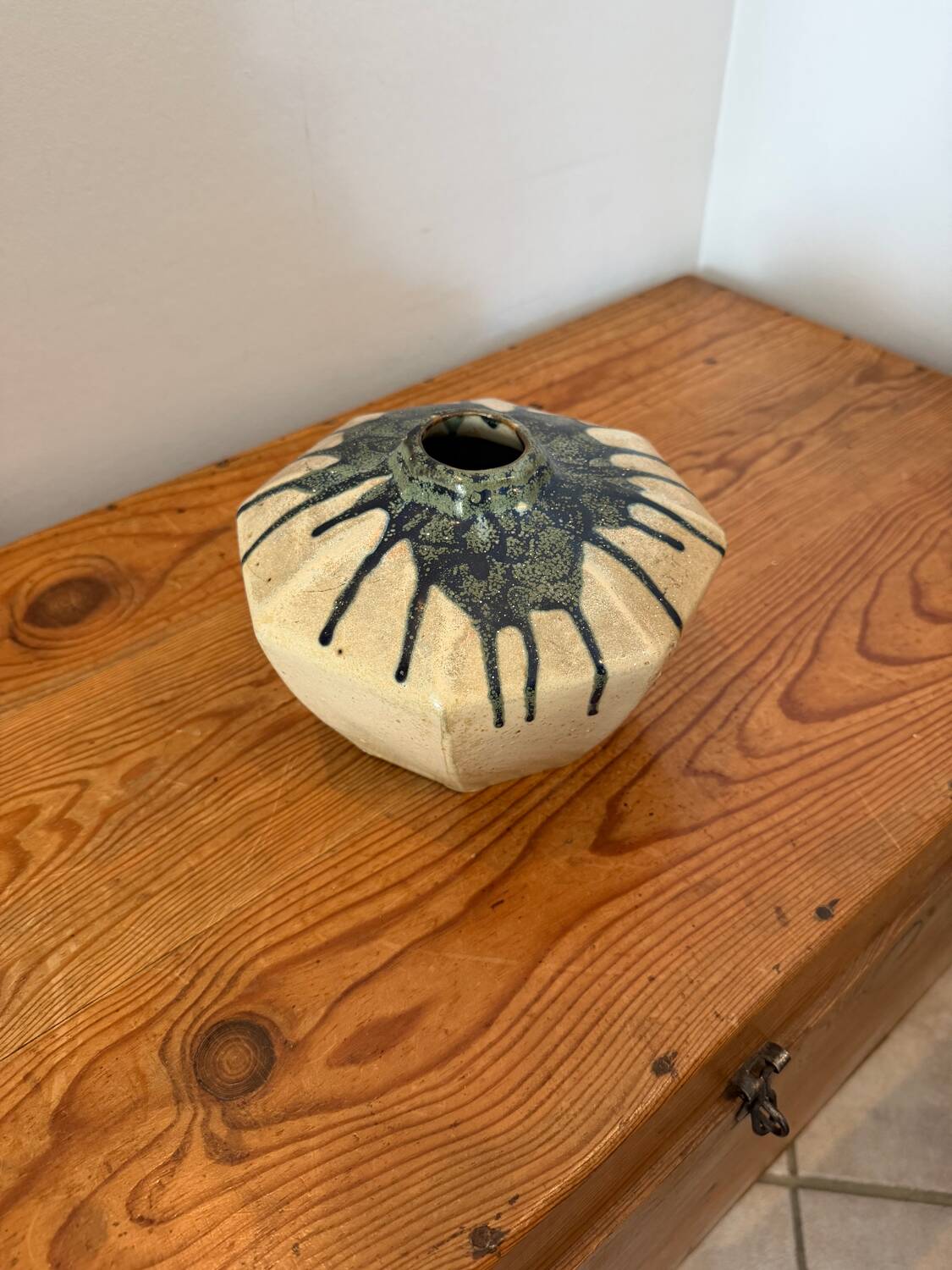 Scandinavian studio vase in flamed stoneware with drip decorations.