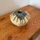 Scandinavian studio vase in flamed stoneware with drip decorations.