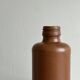 Decorative brown ceramic bottle.