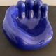 Ceramic ashtray, blue hand shape