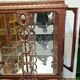 A Louis XV style display cabinet with three beechwood shelves and a white marble top.