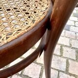 Wooden and cane bistro chairs