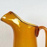 Amber glass carafe from the mid-century German Jagdhaus series and drinking glasses by Wilhelm Braun-Feldweg for Hirschberg, 1960s, set of 7.