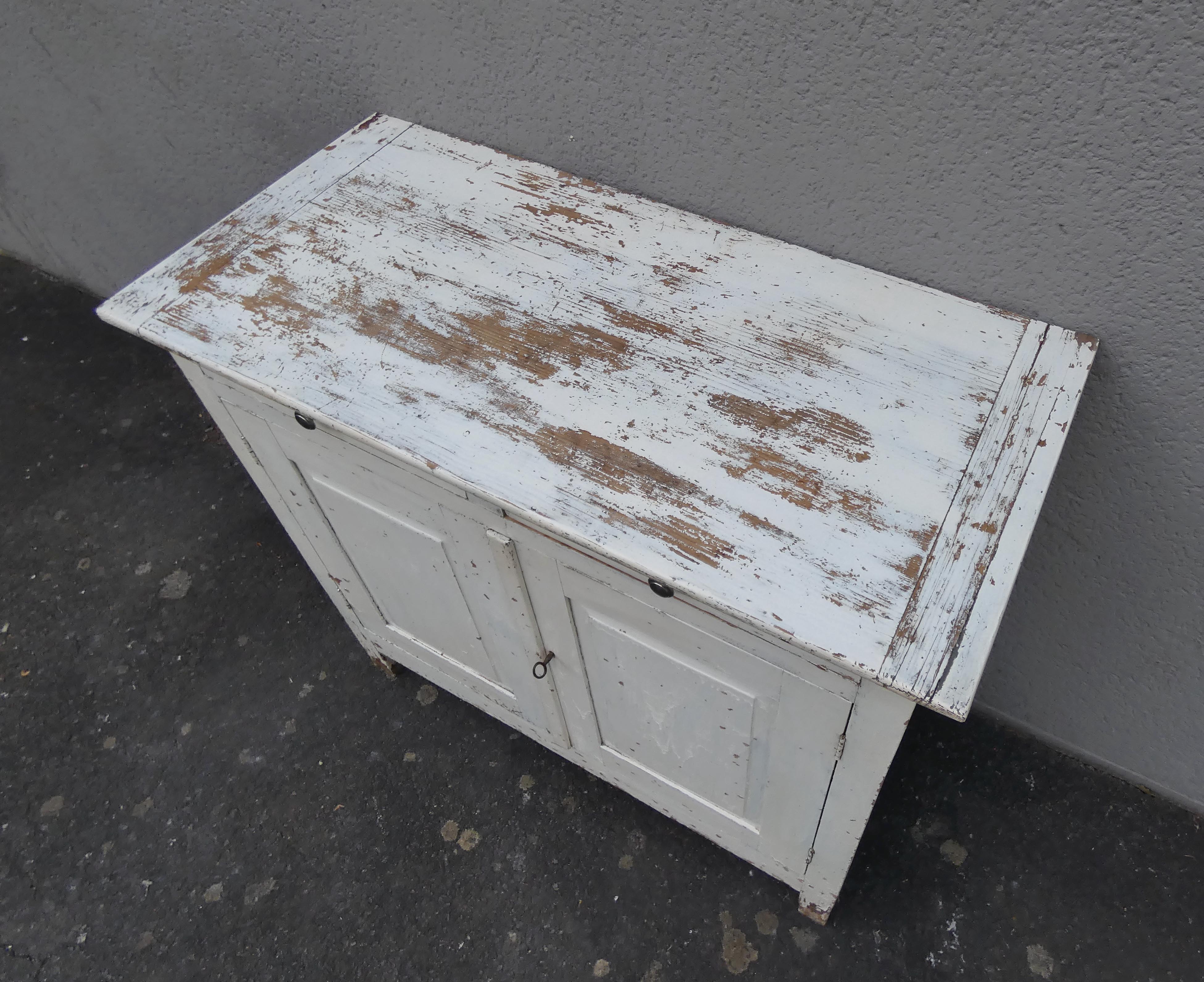 Old patinated wooden sideboard